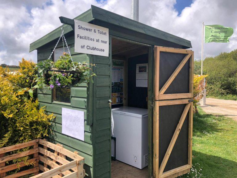 Mousehole Camping Information hut with free chest freezer and information booklets